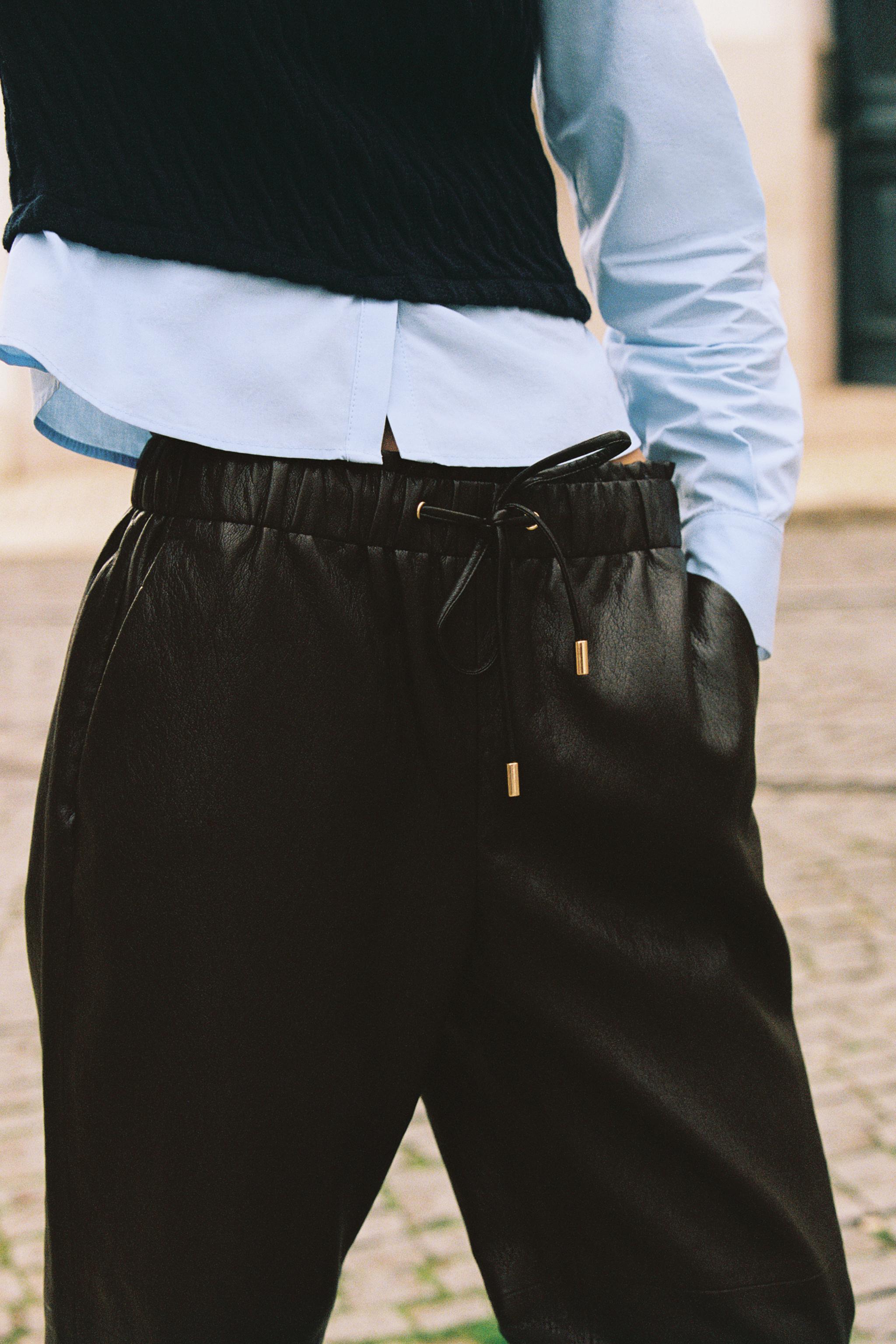 FAUX LEATHER ELASTIC WAIST PANTS